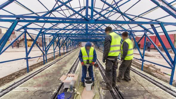 Tram Rails at the Stage of Their Installation and Integration Into Concrete Plates on the Road