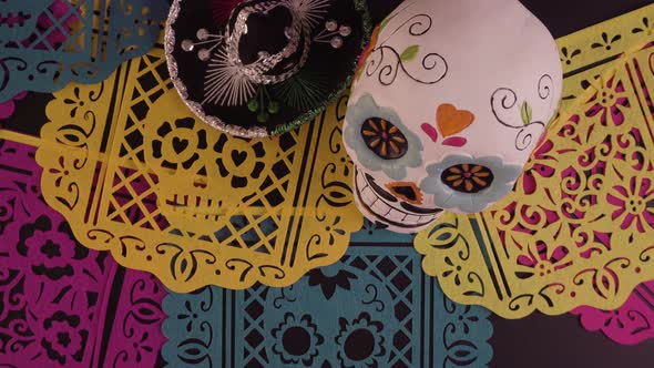 Decorations for traditional Mexican holiday Day of the Dead on a black background