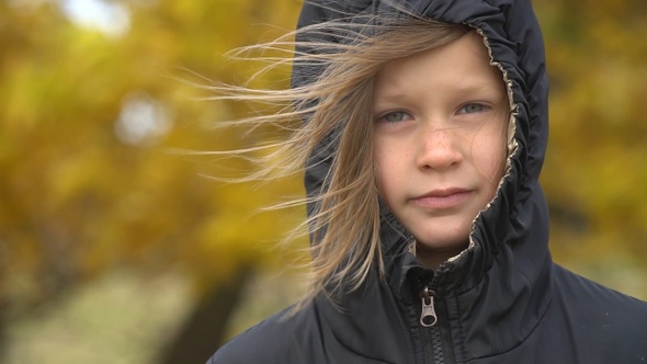 Closeup portrait of a serious adorable little girl.