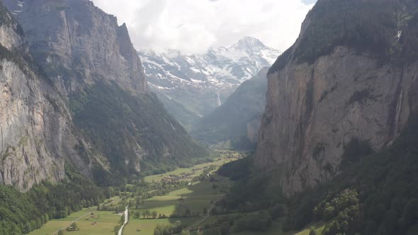 Aerial overview of beautiful green valley in Lauterbrunnen, Switzerland