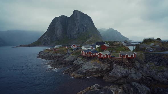 Picturesque aerial view of small village on rocky shore