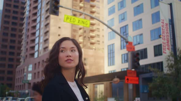 Happy Woman Going on Crosswalk Close Up