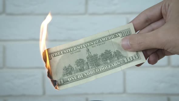Set fire to dollars. 