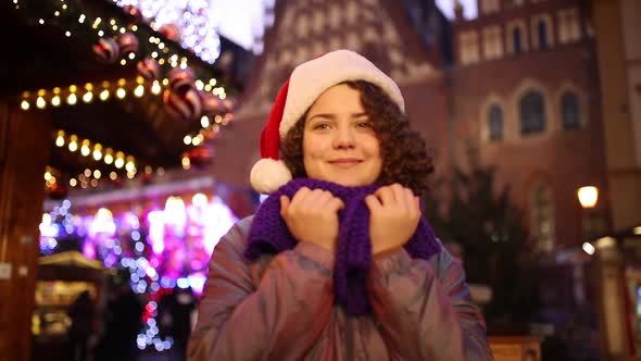 Young girl on Christmas market in Wroclaw, Poland