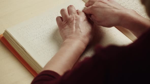 Blind Woman Reading Braille Book Top View Poorly Seeing Female Person Learning to Read Home