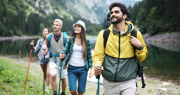 Group of People Hikers Walking in Mountains