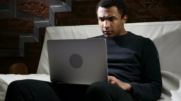 Shocked Man, Amazed by Surprise and Wonder on Laptop