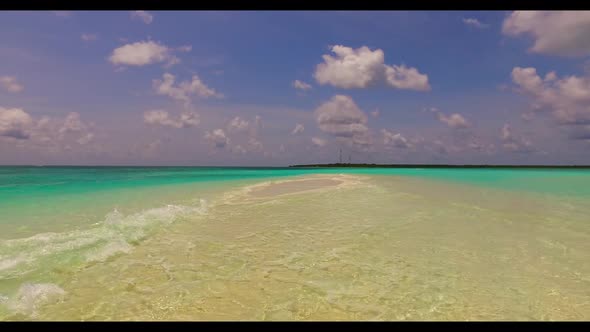 Aerial drone shot landscape of luxury tourist beach voyage by transparent sea with white sand backgr