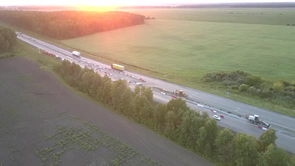 Road Renovation with Equipment at Field in Summer Upper View