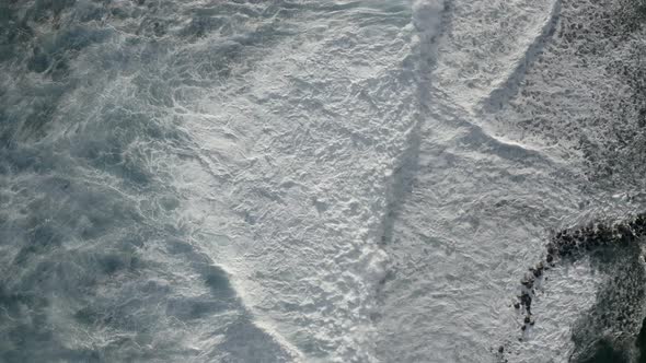 Aerial view of waves at Black Sand Beach, Saint Joseph, Reunion.