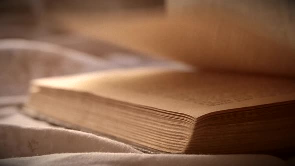 Turn Over Sheets an Old Vintage Book Closeup Lying on a Flat Surface