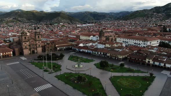 Daytime 4k aerial footage of Plaza de Armas in Cusco City, Peru during Coronavirus quarantine,  left