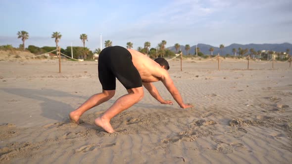 endurance training doing the frog jump seen from behind