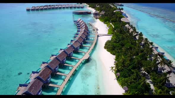 Aerial top view tourism of exotic resort beach voyage by blue sea and white sand background of a day