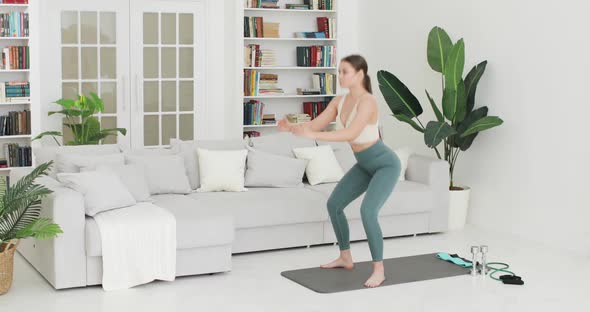 Young Woman is Having Workout