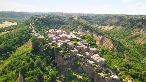 Approaching Civita Di Bagnoregio Medieval Town Perched on a Mountain Italy