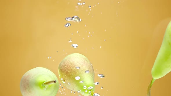 Pears Fall Floating in Water