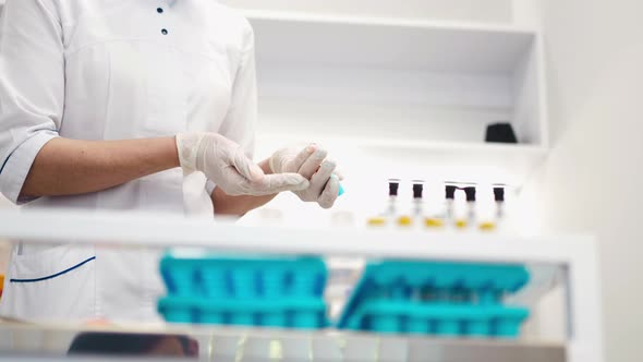 Mixing Blood in Test Tubes alt