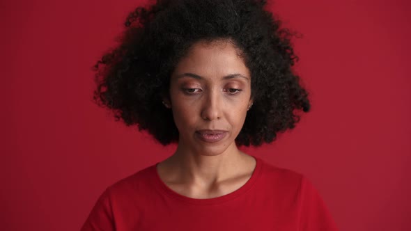 Smiling African woman looking at the camera