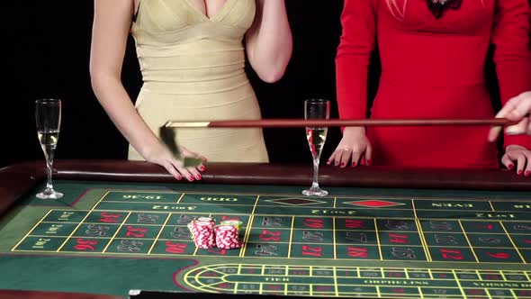 Girls Drink Champagne Playing Roulette