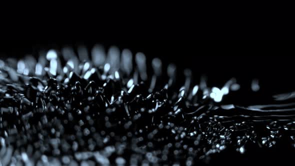 Super Slow Motion Macro Shot of Magnetic Liquid Ferrofluid in Motion at 1000Fps.