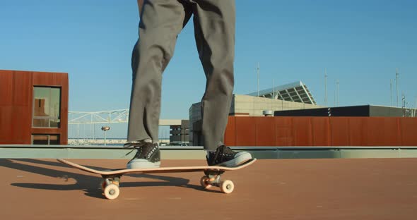 Cool Millennial Do Tricks on Skateboard on Street