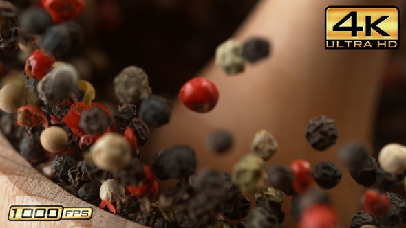 Wooden Mortar Filled with Peppercorns