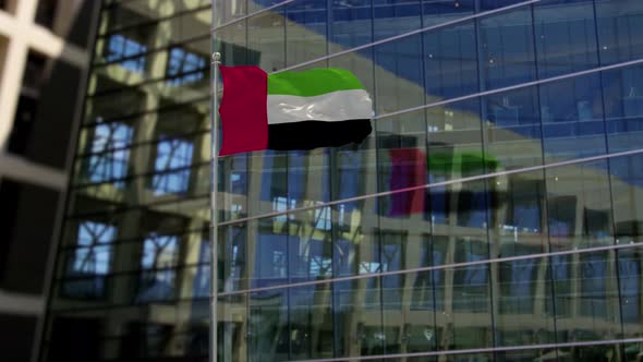 United Arab Emirates Flag Waving On A Skyscraper Building