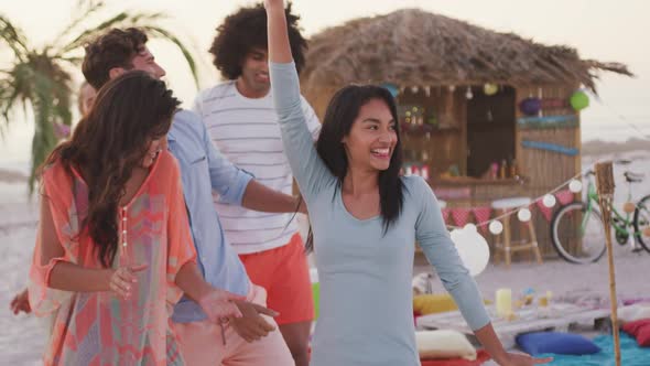 Friends enjoying a party on the beach