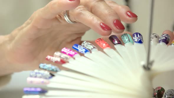 Senior Woman Hands and Nail Samples.