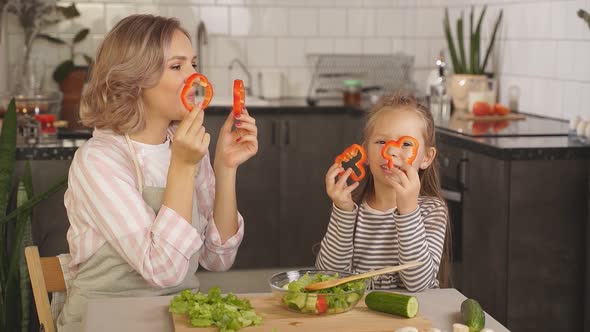 Caucasian Little Girl Her Mother Is Playing Red Pepper Kitchen Home