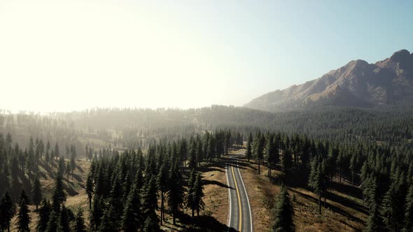 Aerial View of the Old Road Going Through Pass in the Swiss Alps