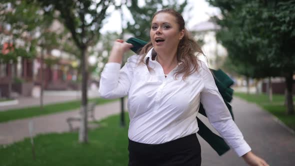 Medium Shot Portrait Joyful Overweight Woman Posing Dancing Having Fun on Sidewalk Outdoors