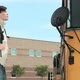 High school student waiting outside on school bus - VideoHive Item for Sale