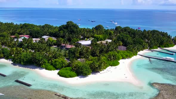 Aerial drone scenery of coast beach by water with sand background