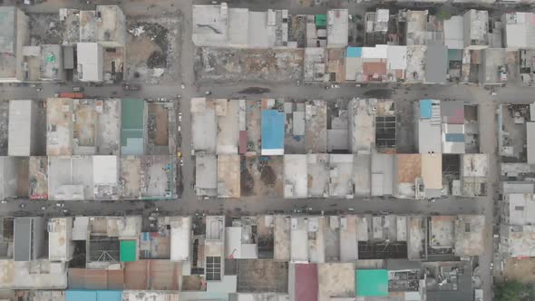 Aerial Top Down View Across Rooftops In Downtown Karachi. Dolly Right