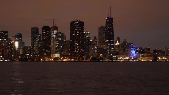 Chicago Navy Pier Ferris Wheel and Waterfront Downtown Buildings at Night