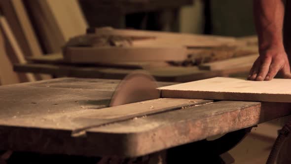 Professional Carpenter Working at His Workshop