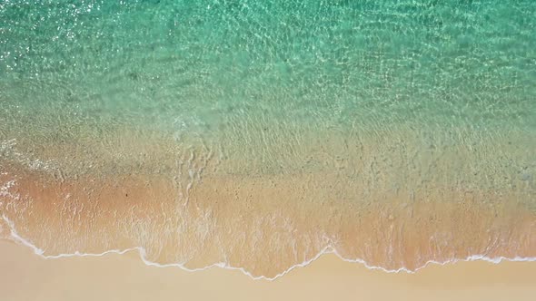 Aerial landscape of paradise bay beach journey by blue ocean and white sandy background of a dayout 