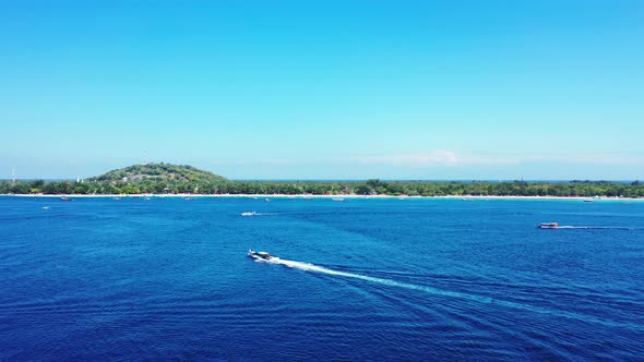 Gili Island, Speedboats Swiftly Sailing Towards The Lush Island On A Bright Sunny Weather - A Wonder