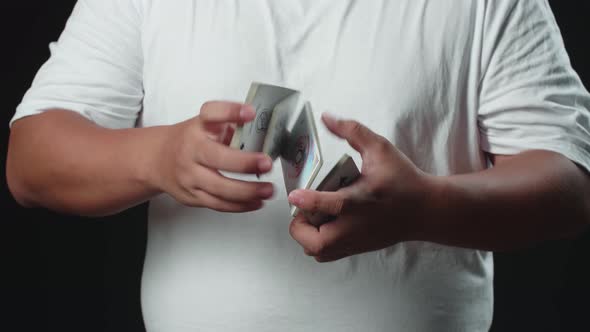 Man Shows Trick With Playing Cards, Cardistry