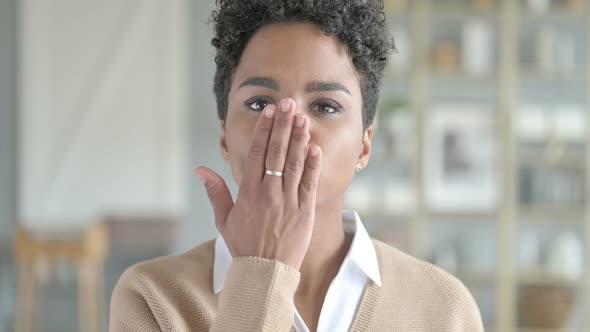 Portrait of Charming Girl Giving Flying Kiss