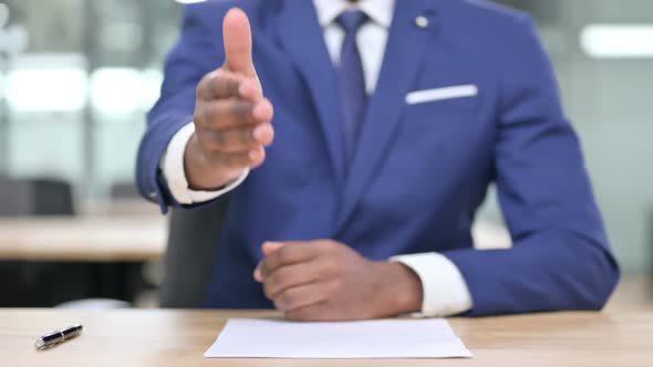 Hand of African Businessman Showing Hand Shake Gesture