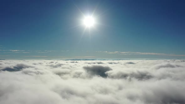 Fog morning at downtown district. Above the clouds.