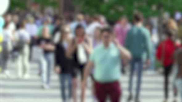 Silhouettes of People Walking in a Crowd Slow Motion