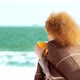 Beautiful Pensive Redhead Woman at the Beach Watching the Sea - VideoHive Item for Sale