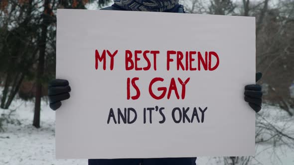 Protesting with a Lgbt solidarity poster My Best Friend Is Gay And Its Okay