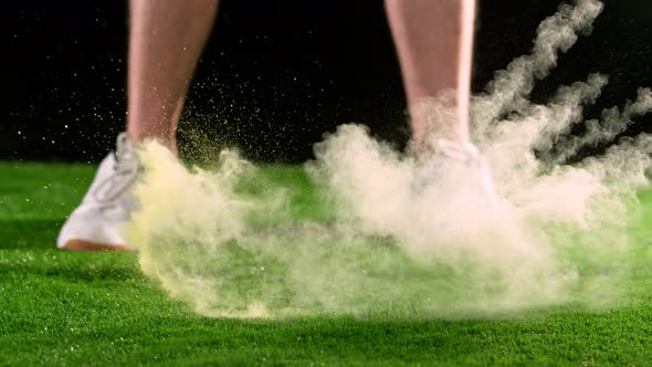 Super Slow Motion Shot of Perfect Golf Stroke With Splashing Powder at 1000 Fps