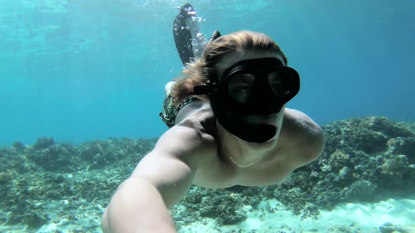 Freediver Swimming Above Coralreef, Indonesia, Gili