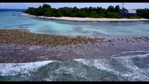 Aerial top down scenery of tranquil coastline beach trip by blue sea and white sand background of a 